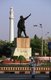 India: Traffic policeman, Subhas Chandra Bose (1897 - 1945) statue and Shahid Minar (background), Kolkata (Calcutta), West Bengal